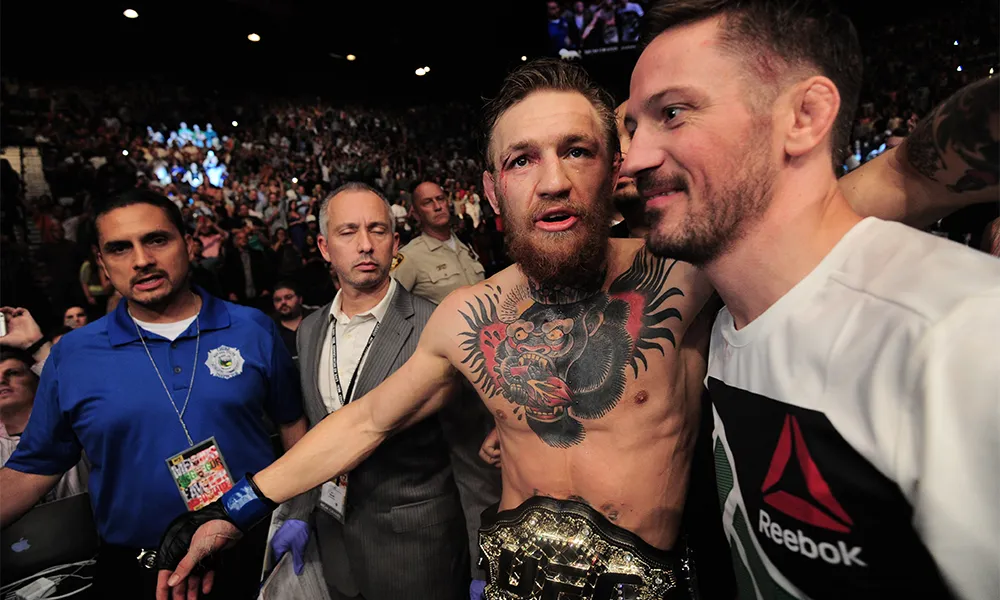 conor-mcgregor y John Kavanagh en el -ufc-189